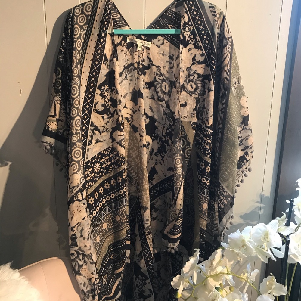 Top piece/cover up with fun fringe!